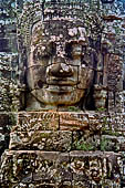 Angkor Thom - Bayon temple, second enclosure, corner towers seen from the central terrace 